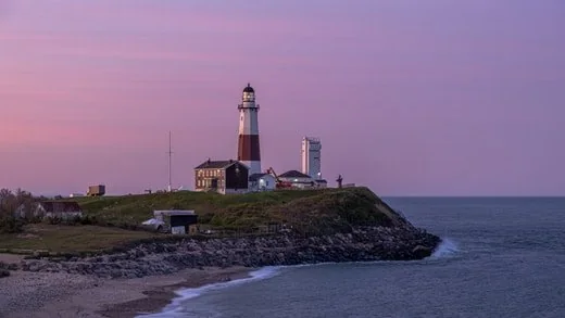 Coastal lighthouse at sunset